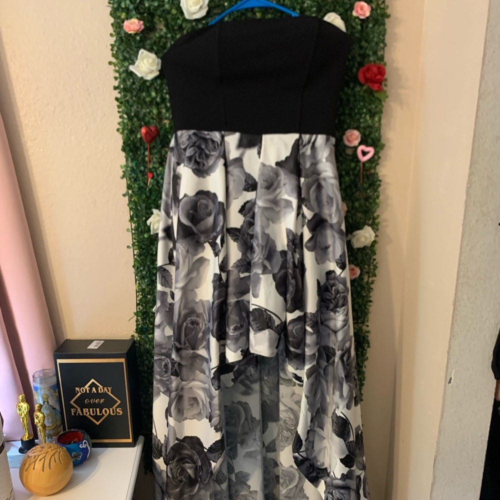 This is a prom dress. Brought from Macys. Size 13. Black&White